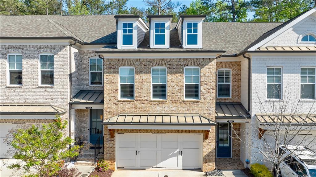 Photo one of 5010 Towneship Creek Rd Roswell GA 30075 | MLS 7553663F