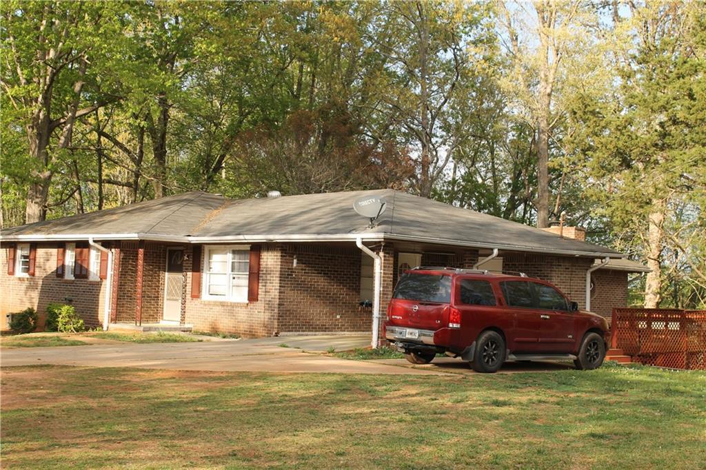 Photo one of 1185 Highway 162 Covington GA 30016 | MLS 7554247F