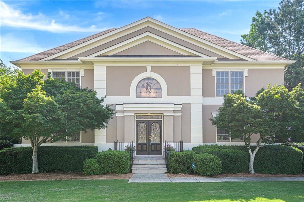 Photo one of 7415 Northampton Ct Cumming GA 30040 | MLS 7554623F