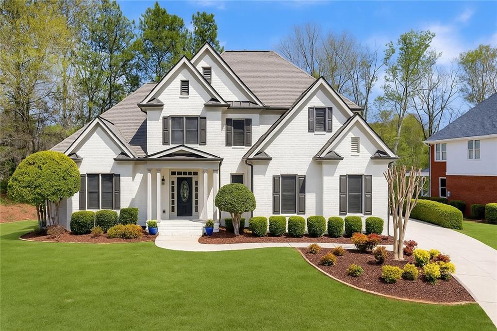 Photo one of 7430 Polo Hl Cumming GA 30040 | MLS 7555765F