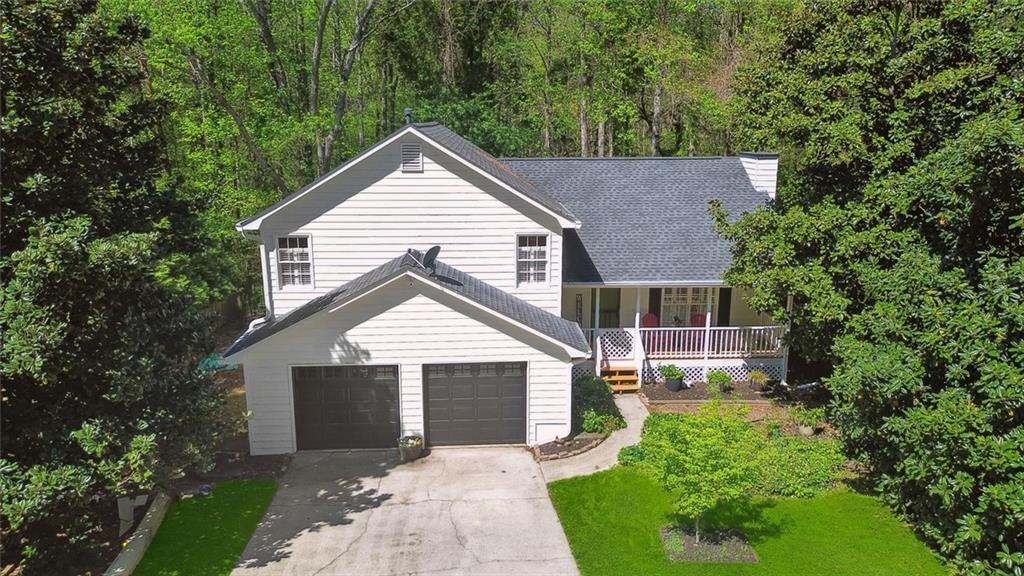 Photo one of 5245 Cherry Hill Ln Powder Springs GA 30127 | MLS 7557296F