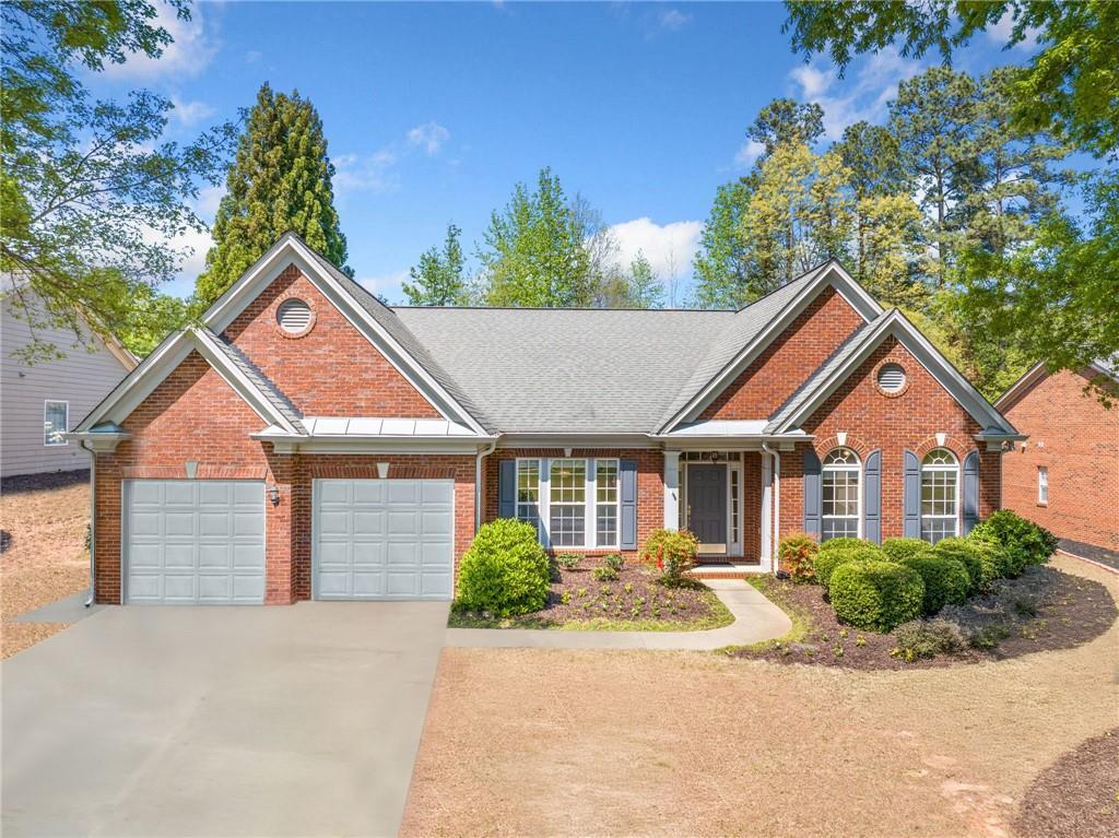 Photo one of 1330 Badingham Dr Cumming GA 30041 | MLS 7558576F