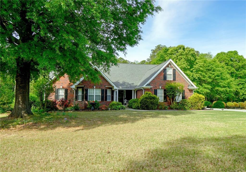 Photo one of 1412 Brighton Pl Loganville GA 30052 | MLS 7559567F