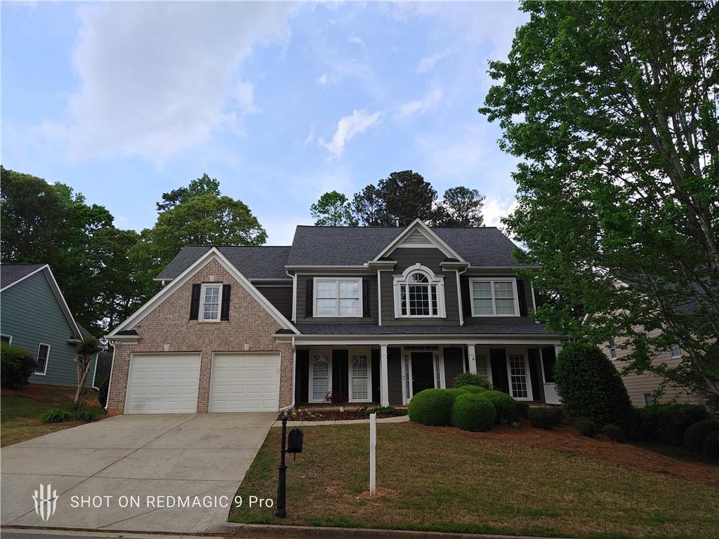 Photo one of 7030 Bennington Ln Cumming GA 30041 | MLS 7560567F