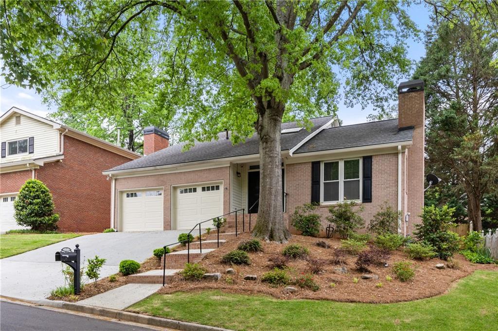 Photo one of 1205 Club Walk Ne Dr Brookhaven GA 30319 | MLS 7561578F