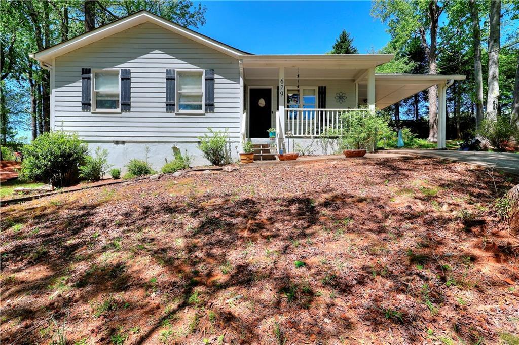 Photo one of 679 Suwanee Ct Lawrenceville GA 30043 | MLS 7561619F