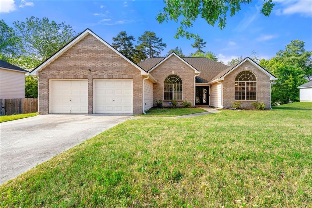 Photo one of 6687 Hill Creek Cv Lithonia GA 30058 | MLS 7561757F
