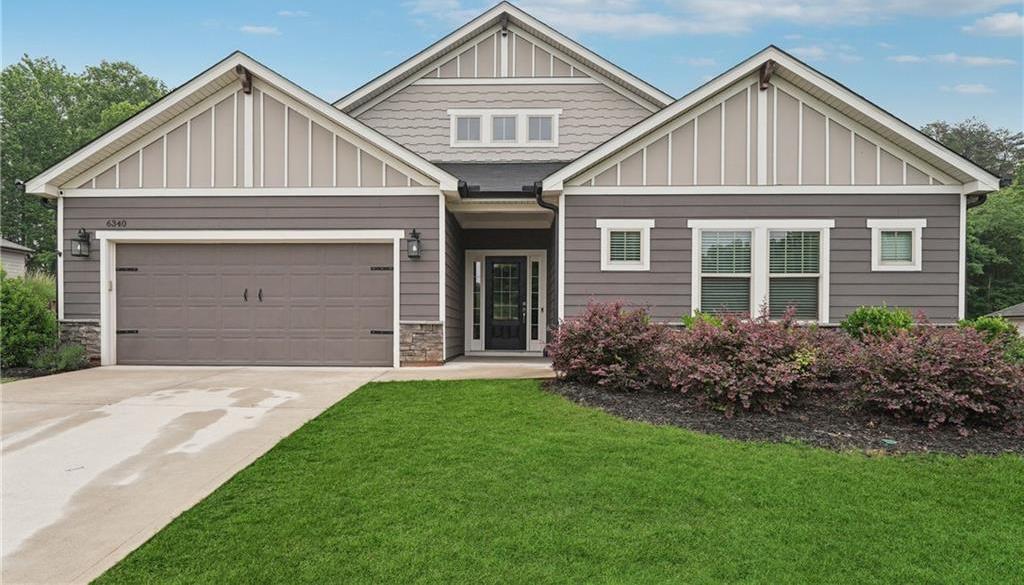 Photo one of 6340 Arlington Cir Cumming GA 30041 | MLS 7562021F