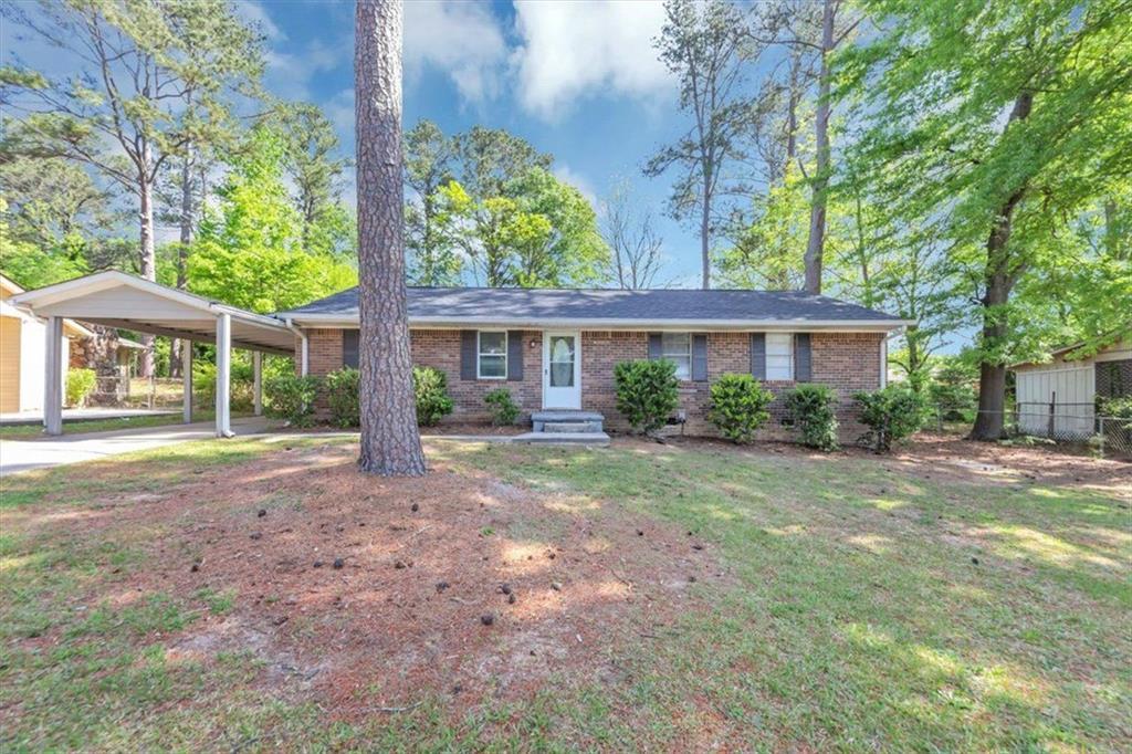 Photo one of 190 Sunrise Cir Riverdale GA 30274 | MLS 7562178F