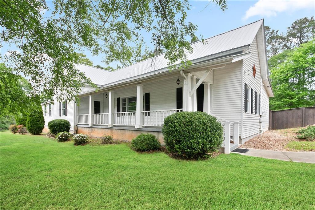 Photo one of 1830 Lost Mountain Rd Powder Springs GA 30127 | MLS 7563465F
