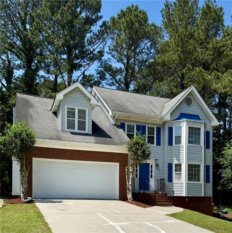 Photo one of 2875 Riverbend Ct Snellville GA 30078 | MLS 7563786F