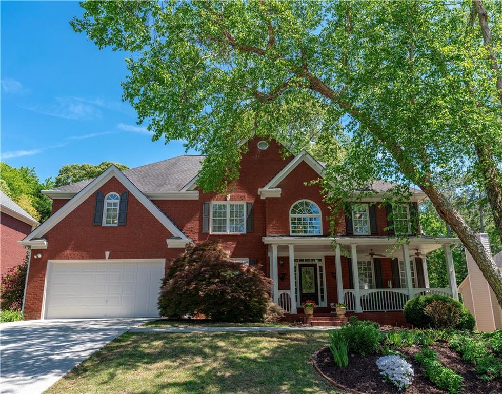 Photo one of 4035 Regal Oaks Dr Suwanee GA 30024 | MLS 7565045F