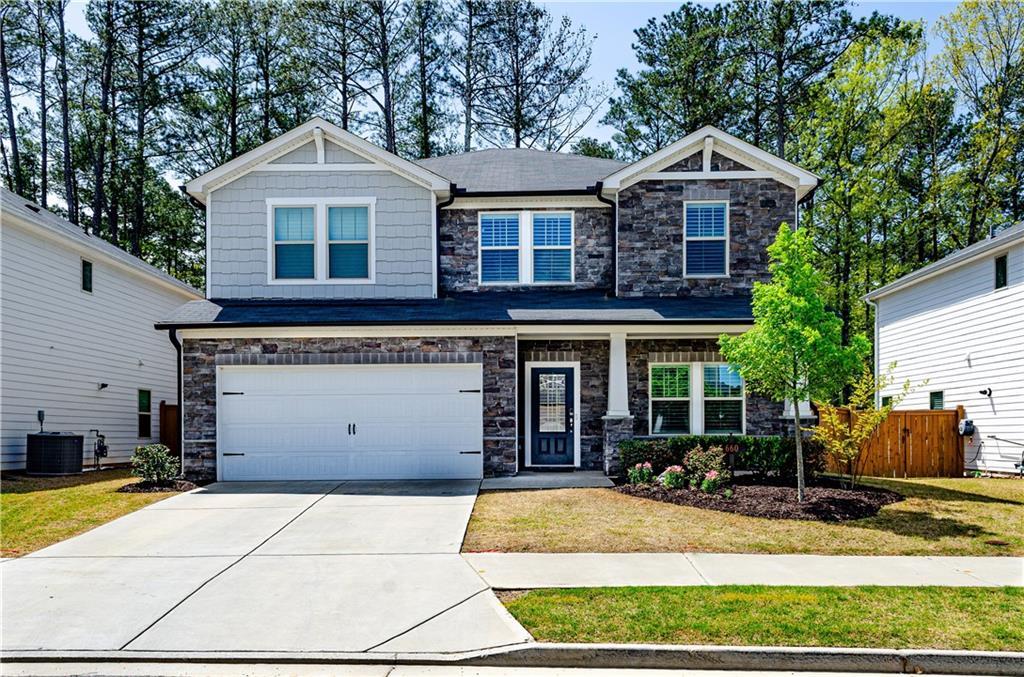 Photo one of 660 Stately Dr Woodstock GA 30188 | MLS 7565265F