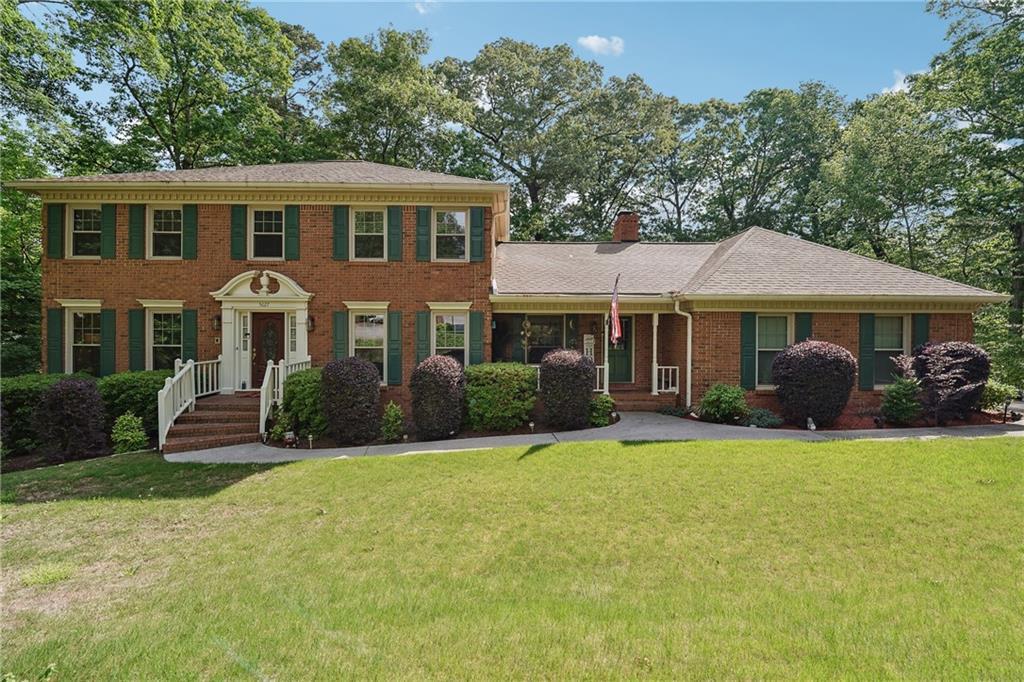 Photo one of 5027 Castlewood Sw Dr Lilburn GA 30047 | MLS 7566867F