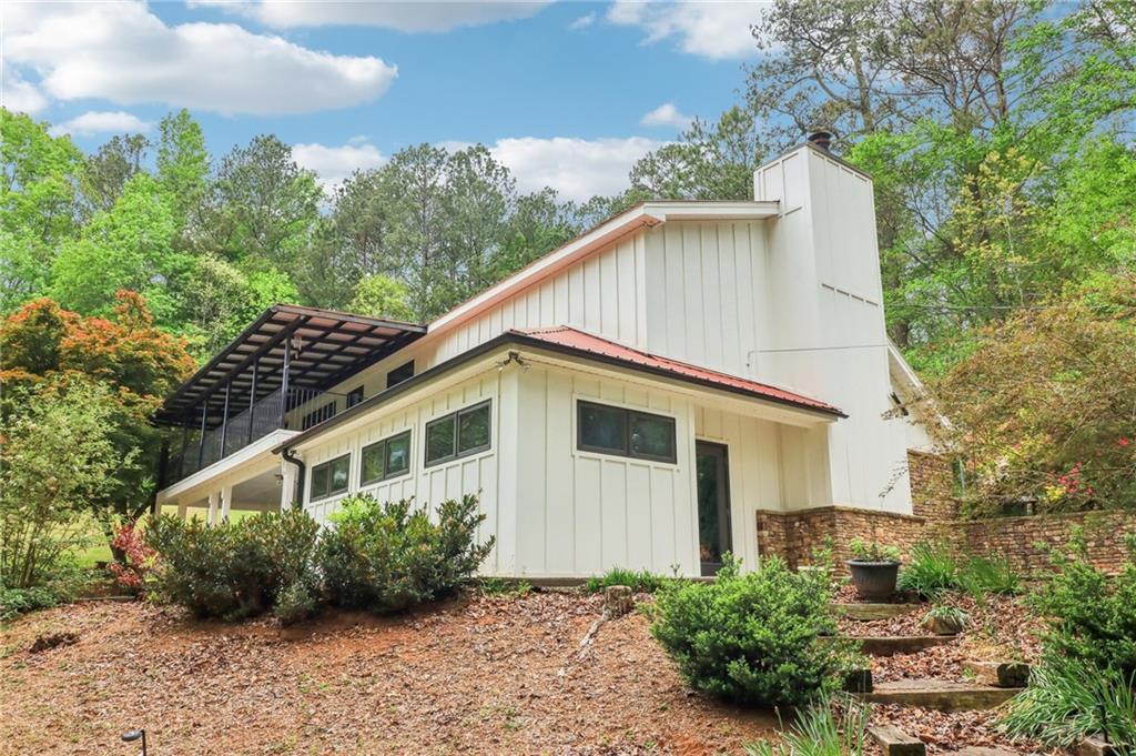 Photo one of 5250 Aubrey Ln Cumming GA 30028 | MLS 7567046F