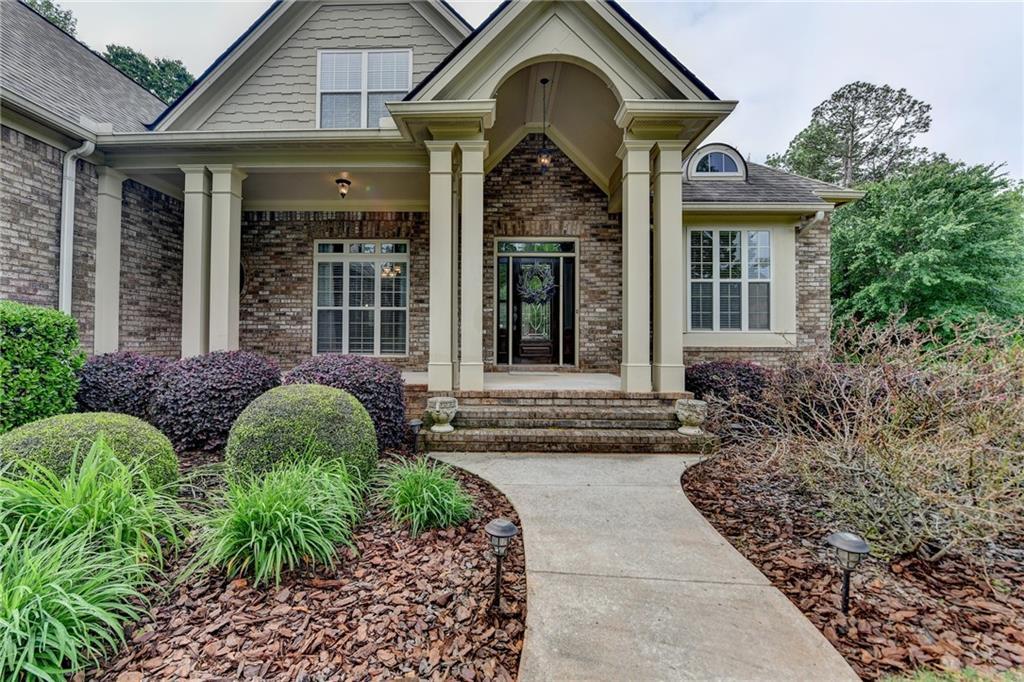 Photo one of 5195 Stefan Ridge Way Buford GA 30519 | MLS 7567648F