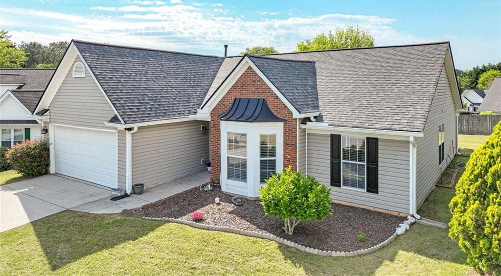 Photo one of 2602 Midler Ct Buford GA 30519 | MLS 7567677F