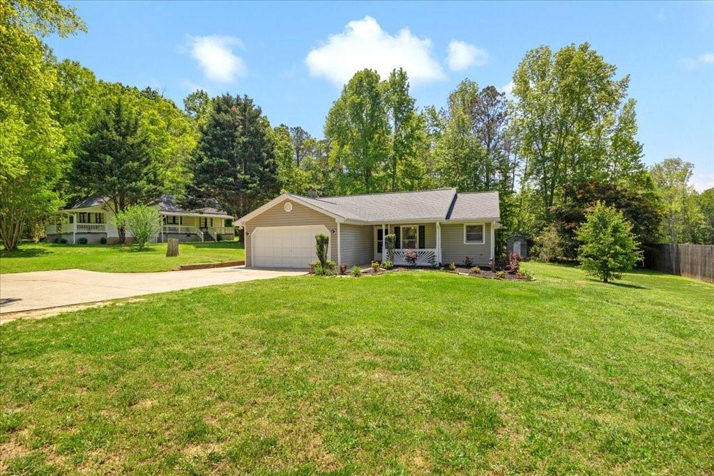 Photo one of 2035 Mountain Rd Cumming GA 30040 | MLS 7567866F