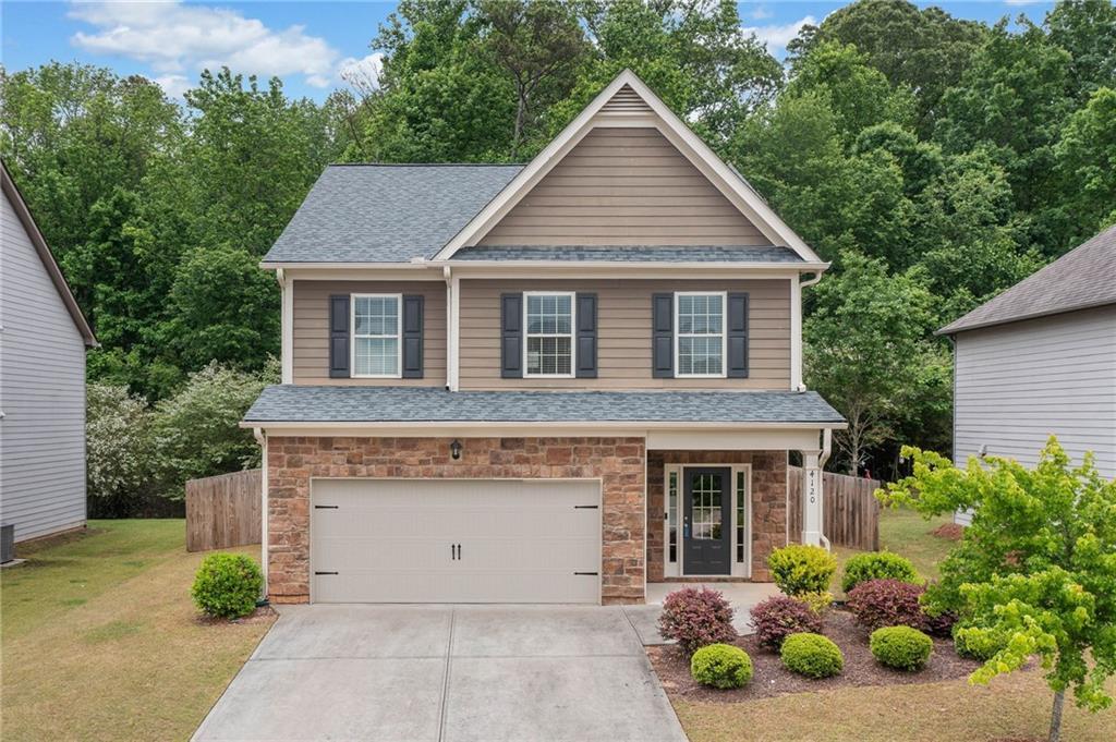 Photo one of 4120 Cordova Ln Cumming GA 30028 | MLS 7568591F