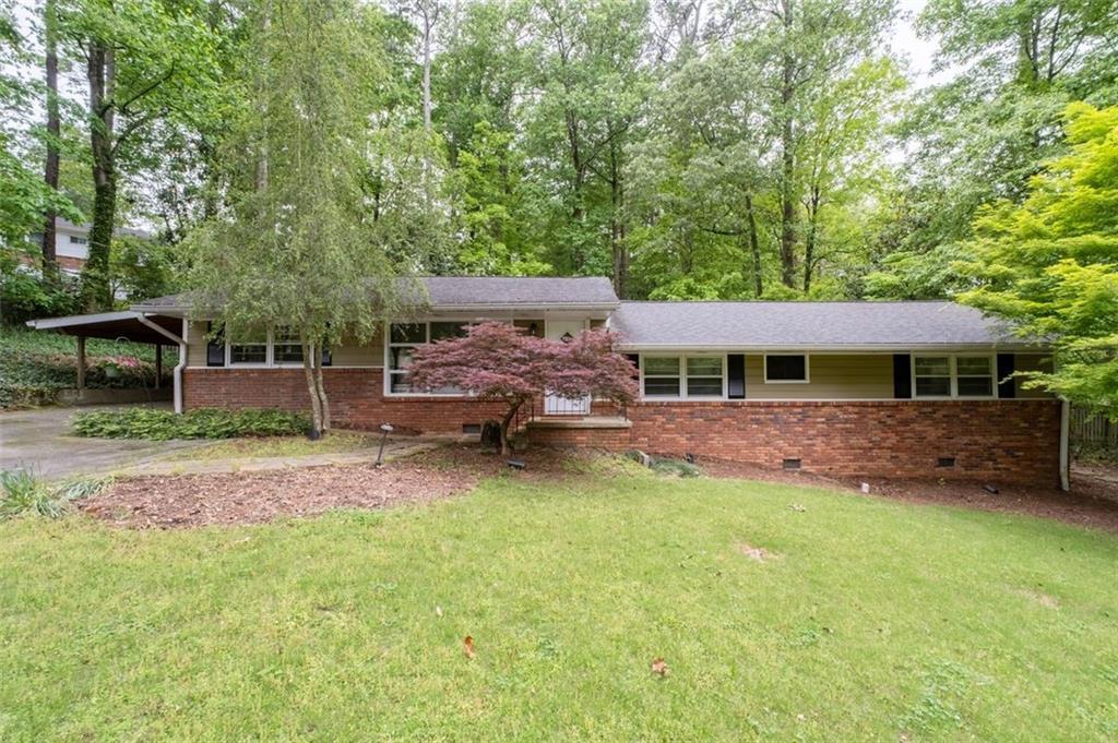 Photo one of 4052 Shawnee Ne Ln Brookhaven GA 30319 | MLS 7568783F