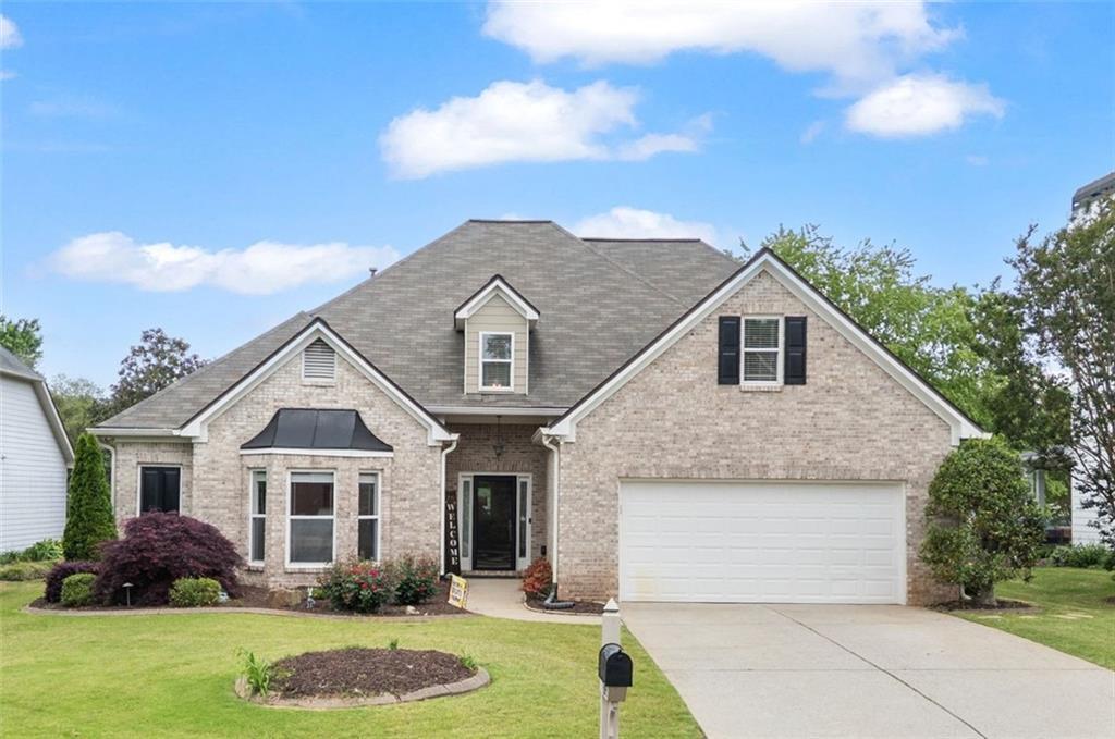 Photo one of 5375 Glenhaven Dr Cumming GA 30041 | MLS 7568969F
