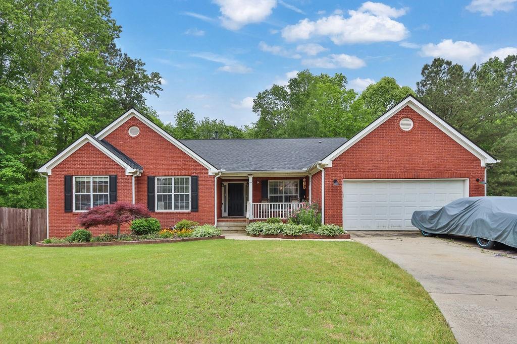 Photo one of 2582 Oak Bluff Dr Dacula GA 30019 | MLS 7569234F
