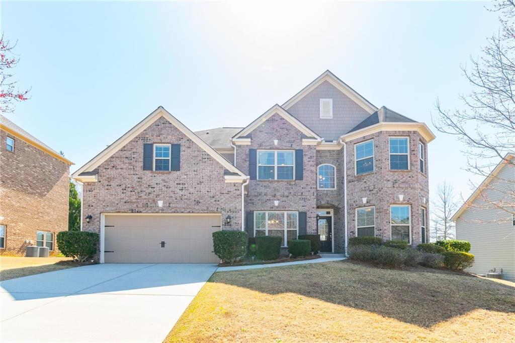 Photo one of 335 Roberts Run Cv Suwanee GA 30024 | MLS 7570244F