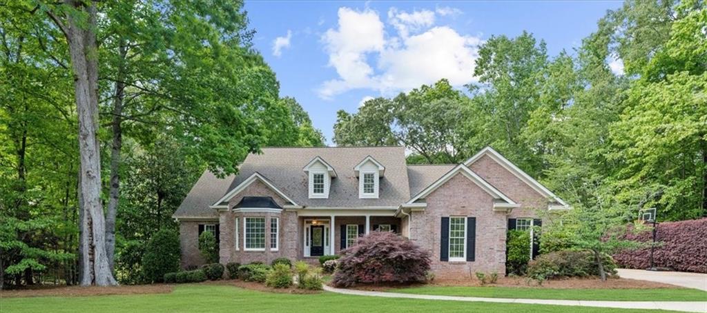 Photo one of 3445 Strawberry Ln Cumming GA 30041 | MLS 7570532F