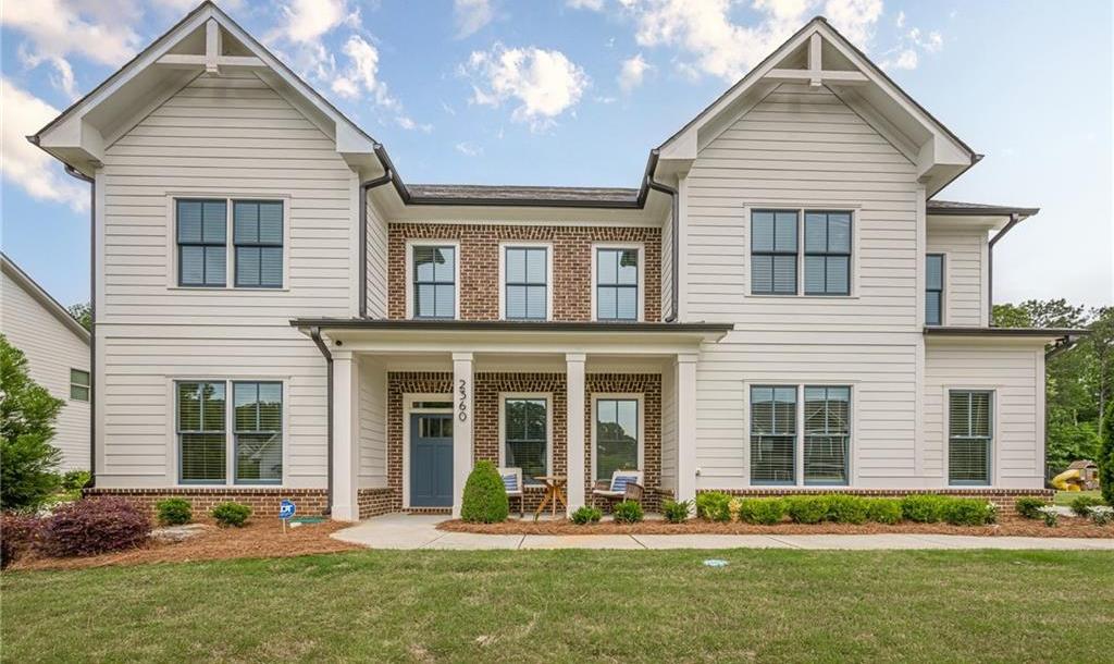 Photo one of 2360 Charleston Manor Ln Suwanee GA 30024 | MLS 7570639F