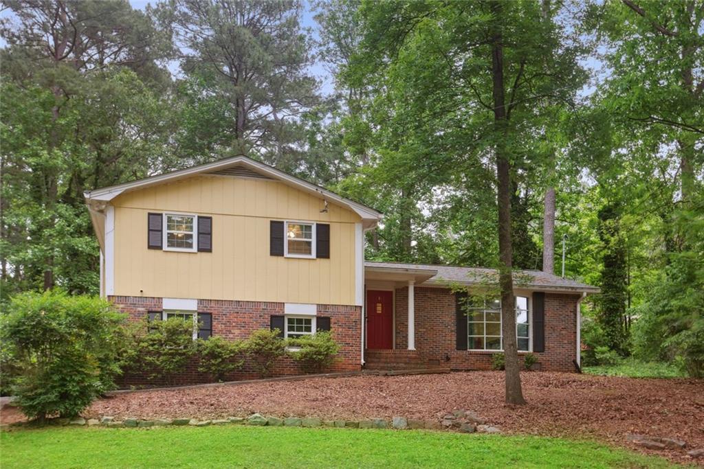 Photo one of 358 W West Wind Sw Dr Lilburn GA 30047 | MLS 7570713F