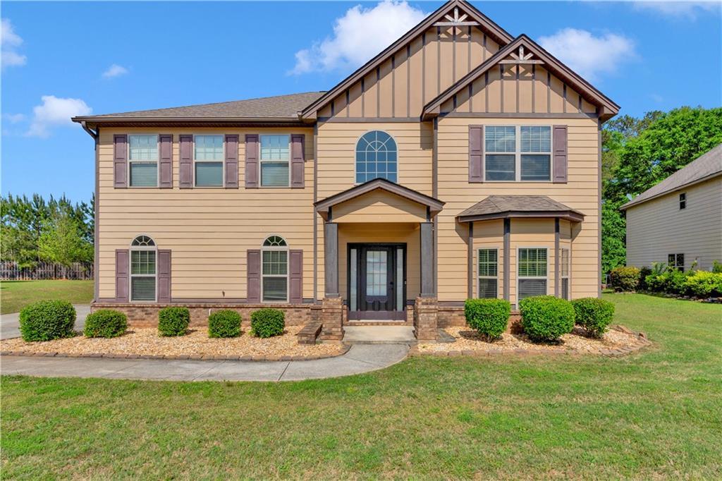 Photo one of 105 Tanners Ct Covington GA 30016 | MLS 7570763F