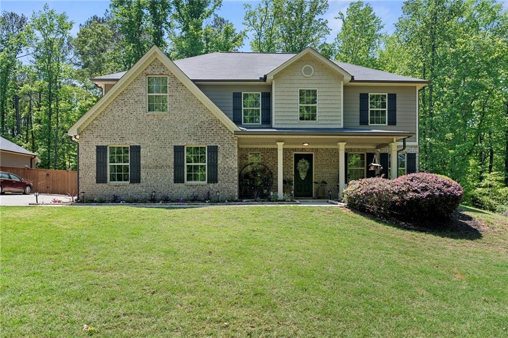 Photo one of 165 6Th St Auburn GA 30011 | MLS 7571204F