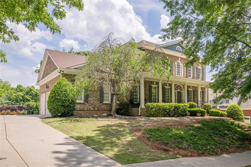 Photo one of 4891 Tarry Post Ln Suwanee GA 30024 | MLS 7571326F