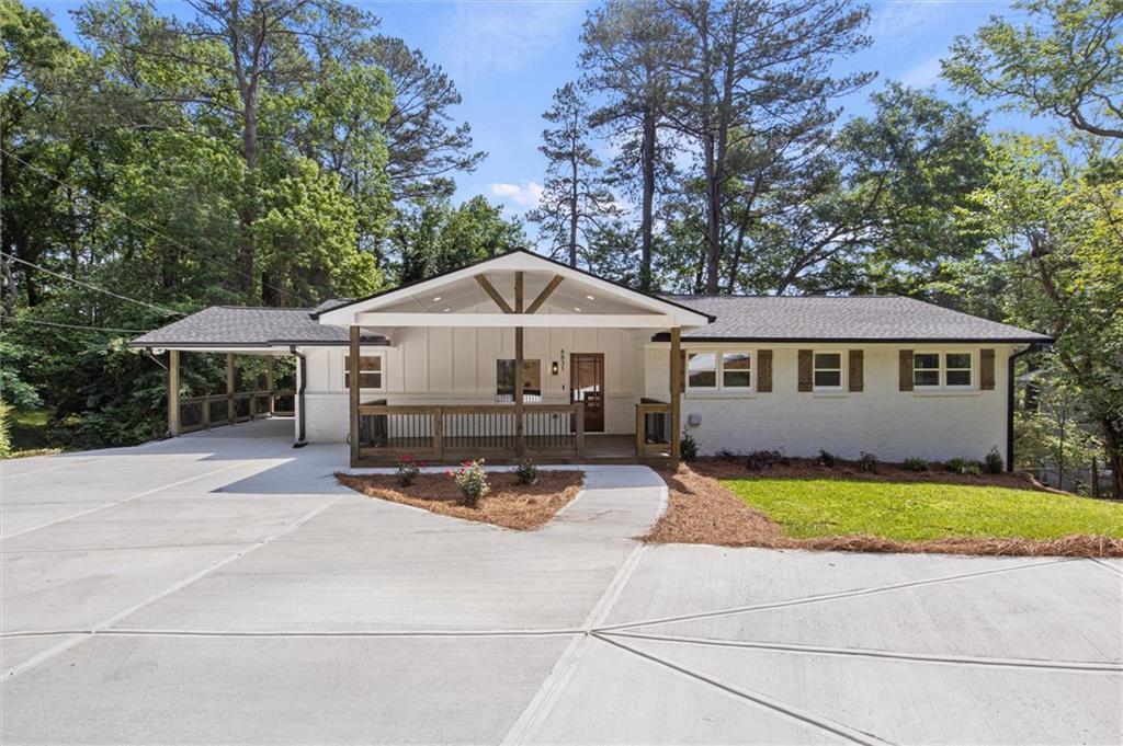 Photo one of 6835 Sunny Brook Ln Atlanta GA 30328 | MLS 7571570F