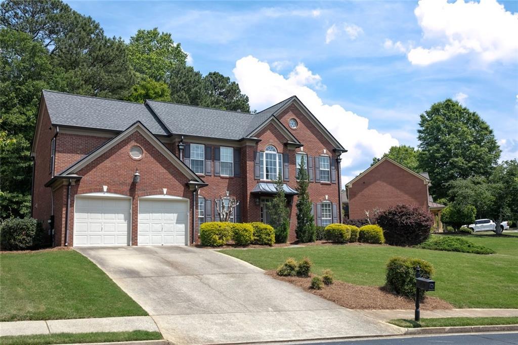 Photo one of 601 Hexham Ct Suwanee GA 30024 | MLS 7571843F