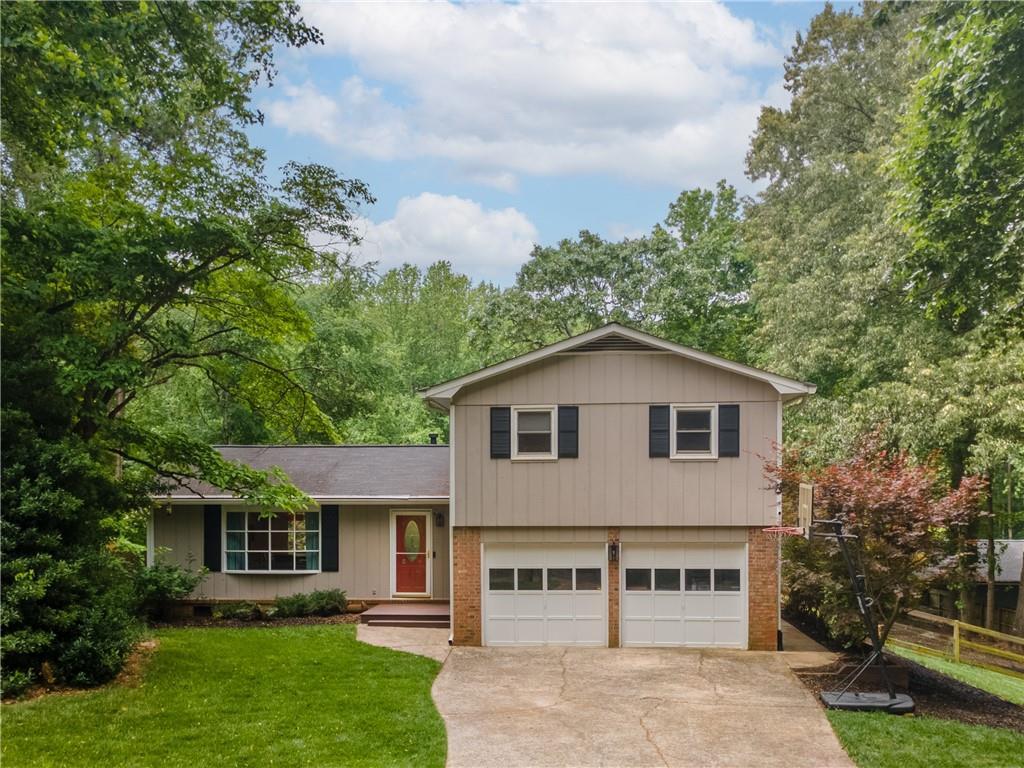 Photo one of 287 West Wind Dr Lilburn GA 30047 | MLS 7571946F