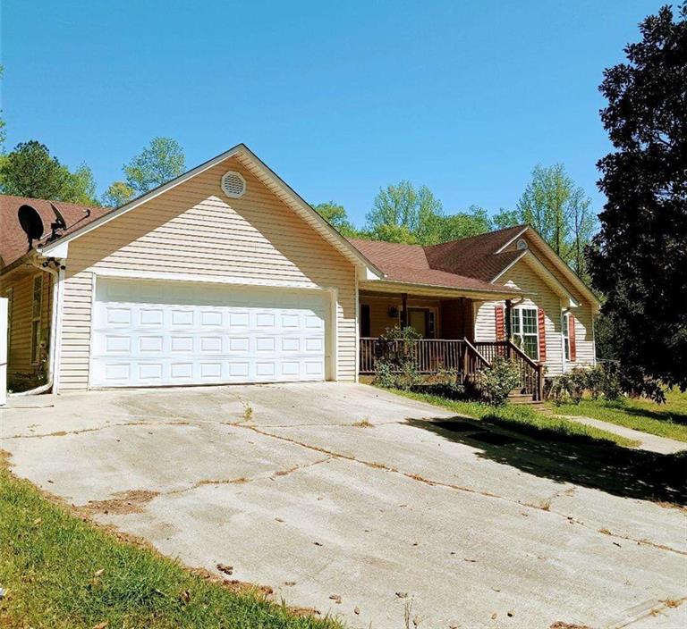 Photo one of 6690 Jenkins Rd Fairburn GA 30213 | MLS 7571972F