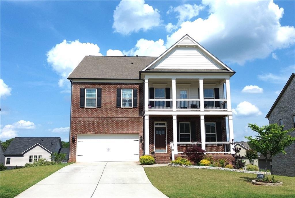 Photo one of 4071 Woodward Walk Ln Suwanee GA 30024 | MLS 7571998F