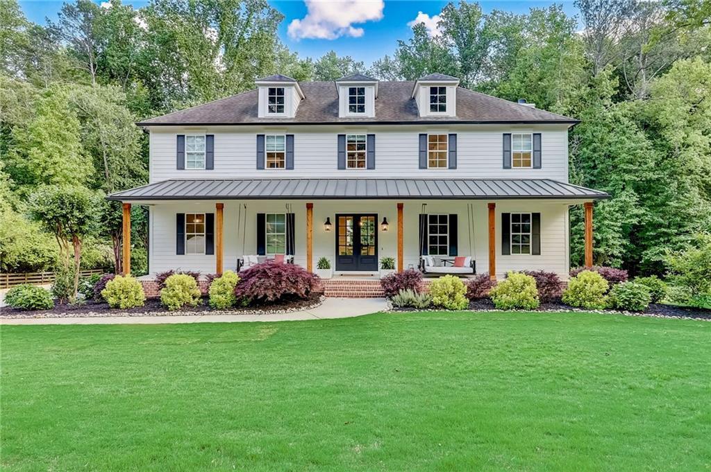 Photo one of 650 Jones Rd Roswell GA 30075 | MLS 7572217F
