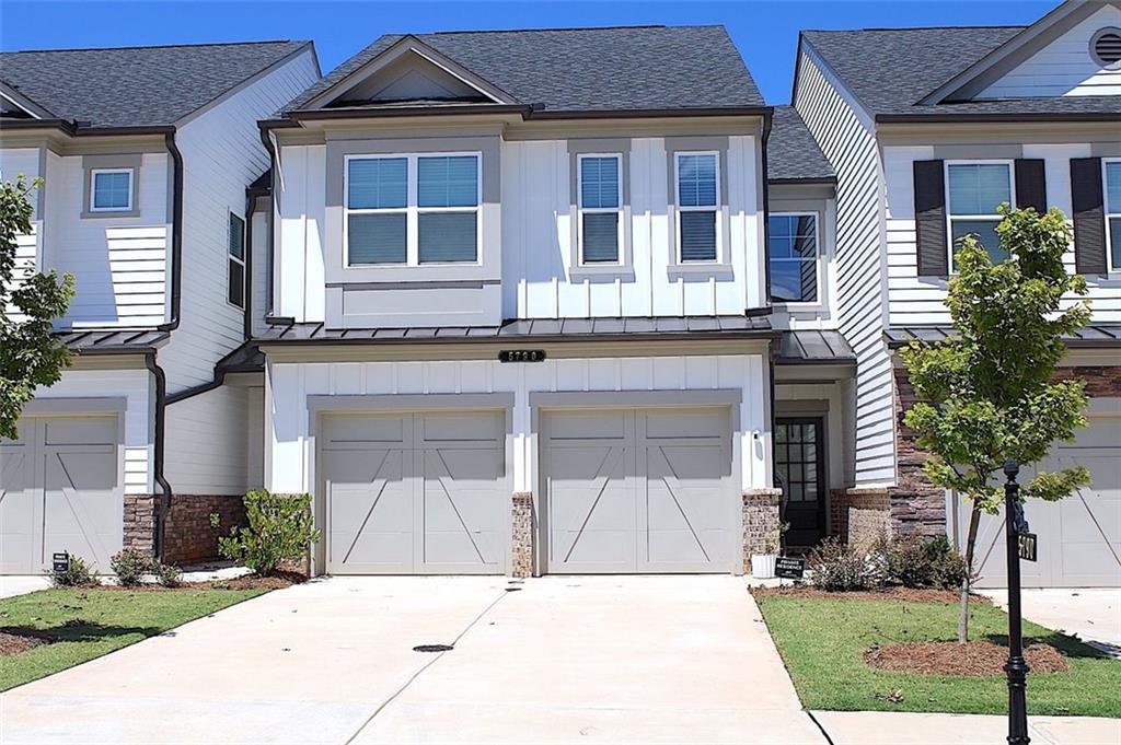 Photo one of 5790 Thornton Dr Cumming GA 30028 | MLS 7573323F