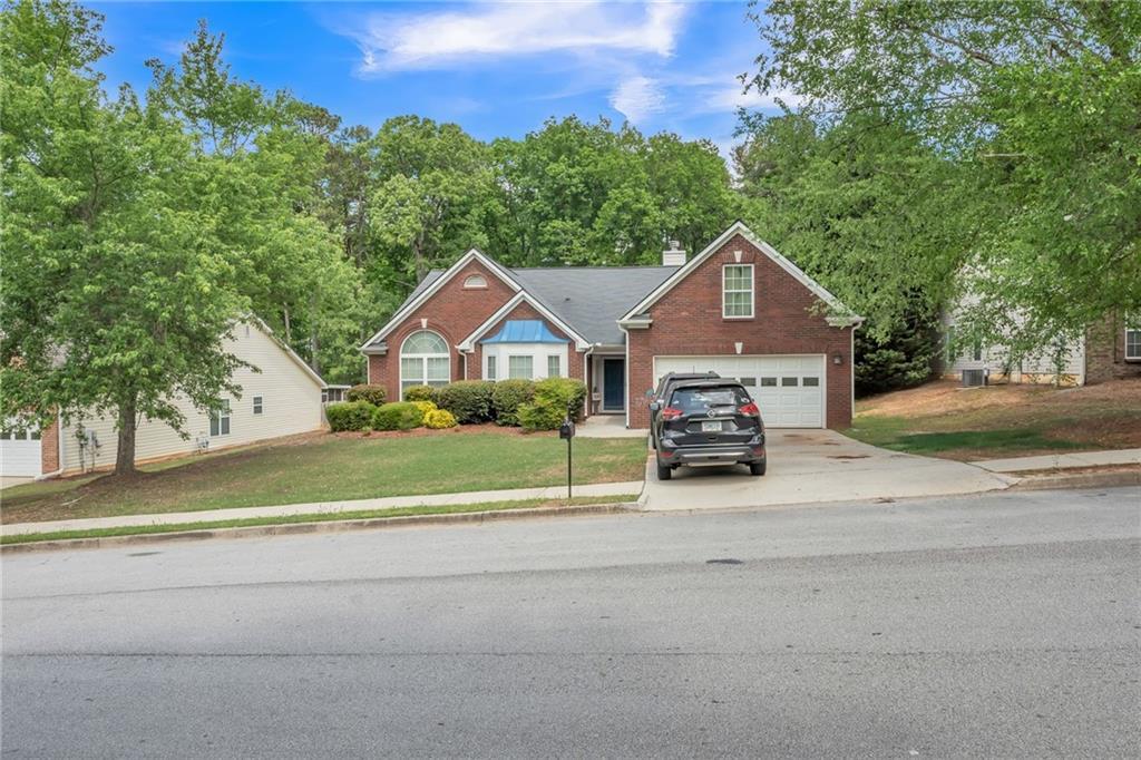 Photo one of 2606 Fairmont Park Ct Dacula GA 30019 | MLS 7573897F