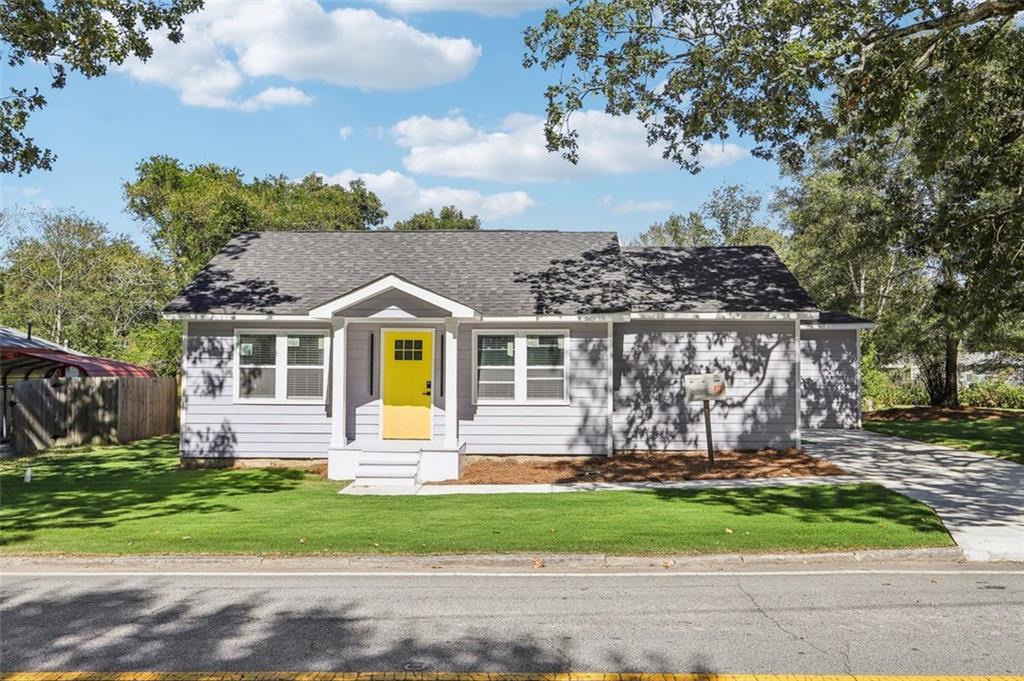 Photo one of 7540 Conyers St Lithonia GA 30058 | MLS 7574044F