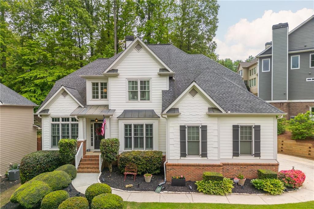Photo one of 690 Sienna Dr Cumming GA 30040 | MLS 7574118F