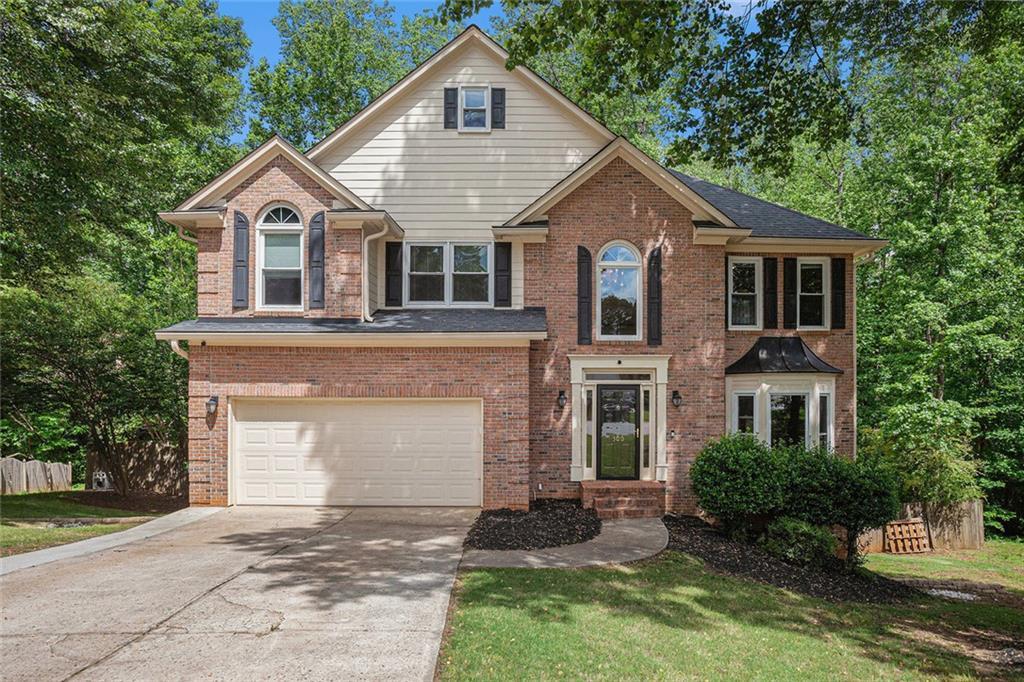 Photo one of 300 Wesfork Nw Way Suwanee GA 30024 | MLS 7574587F