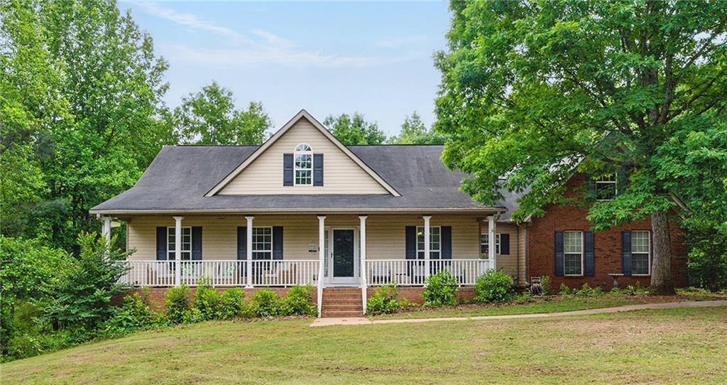 Photo one of 418 Whisper Wood Way Locust Grove GA 30248 | MLS 7575633F