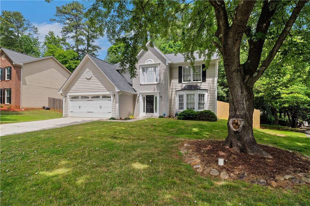 Photo one of 5320 Taylor Rd Alpharetta GA 30022 | MLS 7575847F