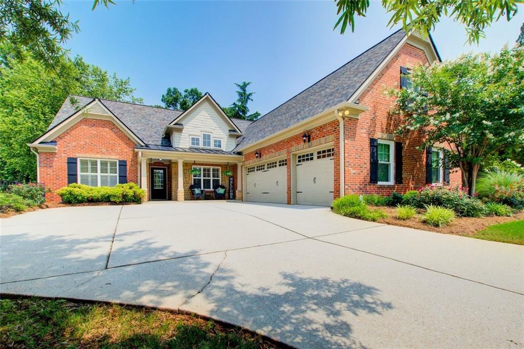 Photo one of 5220 Wild Cedar Dr Buford GA 30518 | MLS 7582691F