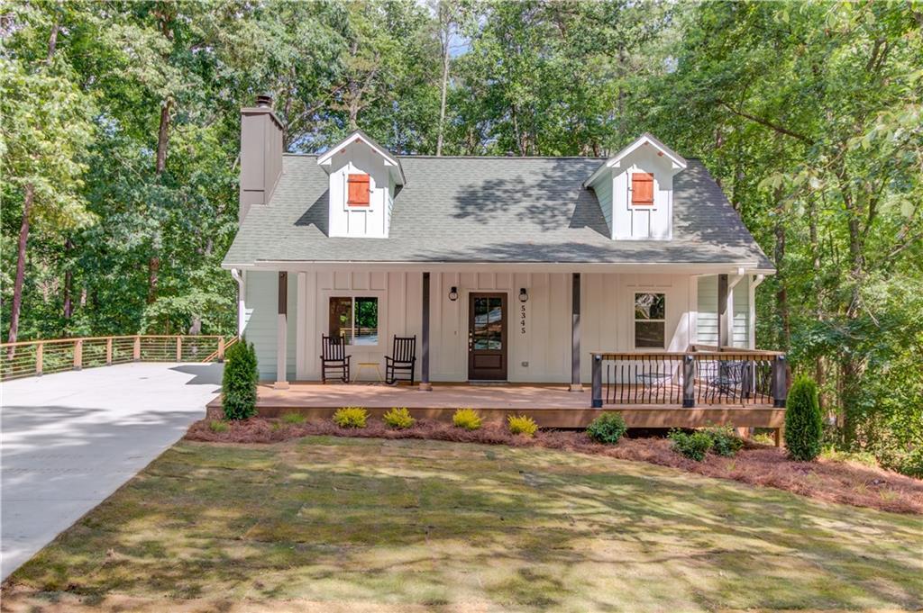 Photo one of 5345 Pilgrim Point Rd Cumming GA 30041 | MLS 7583887F