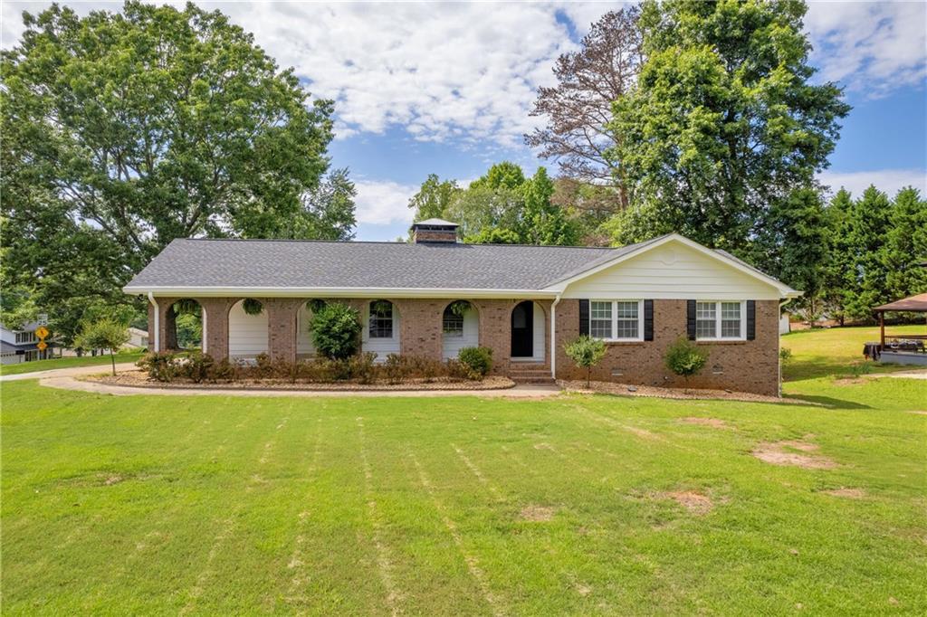 Photo one of 3642 S Bogan Rd Buford GA 30519 | MLS 7585482F