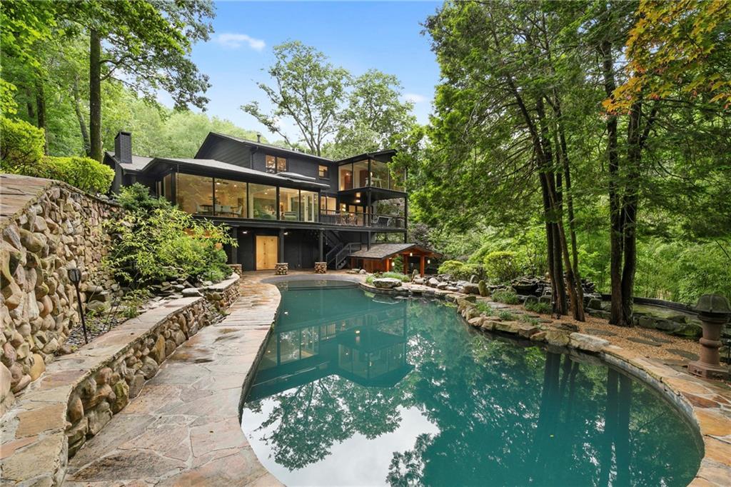 Photo one of 4601 Tall Pines Nw Dr Atlanta GA 30327 | MLS 7585573F